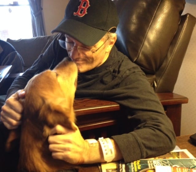 Let’s WOOF about two touching photos of a golden retriever giving and receiving love.